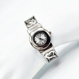 MOVT Women’s Silver-Tone Cuff Bracelet Quartz Watch – Heart Cutout Design